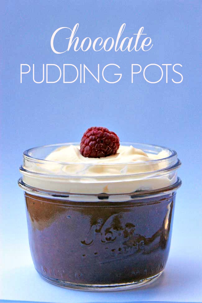 little chocolate puddings in pots with fluffy whipped cream. Perfect for dessert!