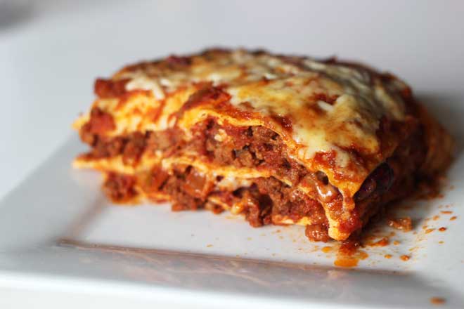 This Mexican-style lasagne is For when you want a lasagne that tastes like a bean burrito - awesome to cook for a crowd!