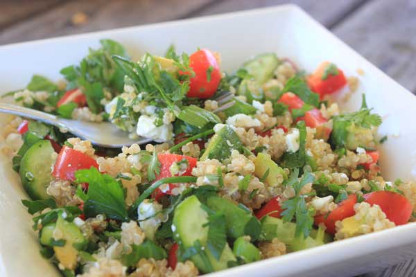 Herby Lemon Quinoa Salad: a super-tangy, crunchy, summery salad full of fresh veg, quinoa, salty feta and a lemon-herb dressing.